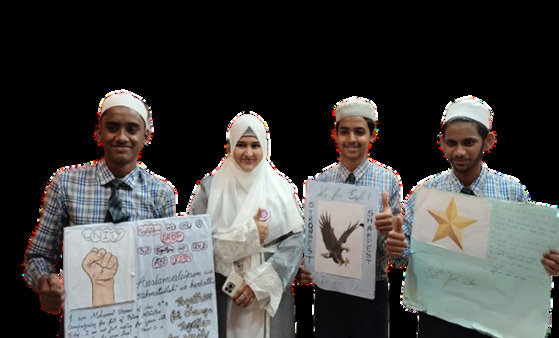 Students presenting handmade art posters